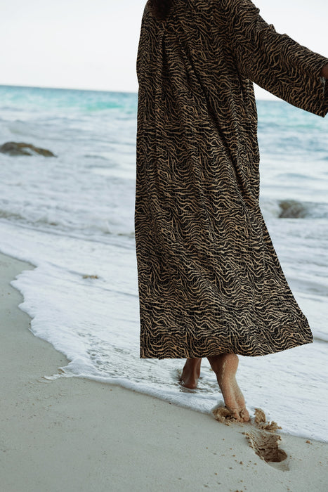 The Saint Caftan in Animal Waves